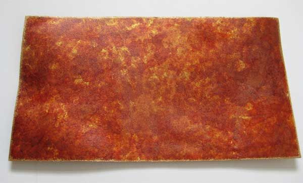 Painted side of the leather, after alcohol ink has been applied