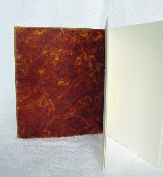 Alcohol inked leather as end pages The assembled book showing alcohol inked inside cover
