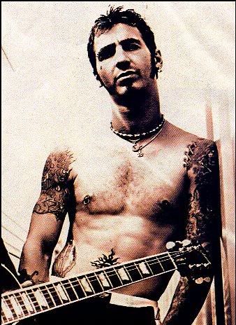 I have always had the biggest crush on Sully Erna from Godsmack.