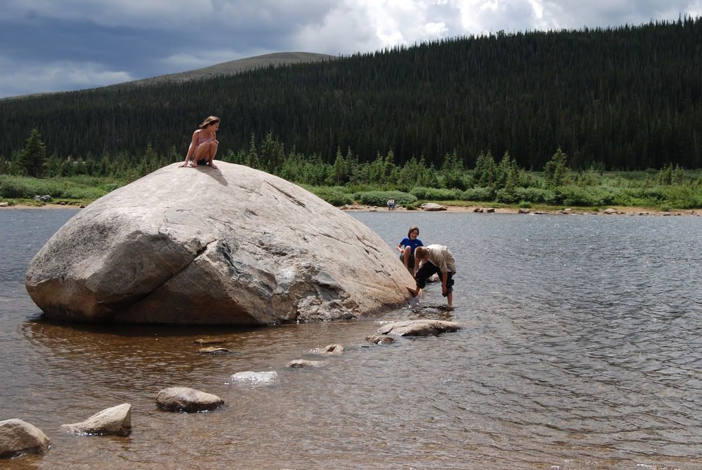 Zaidee, Cyrus and Gage climbing on the big rock at Brainard Lake